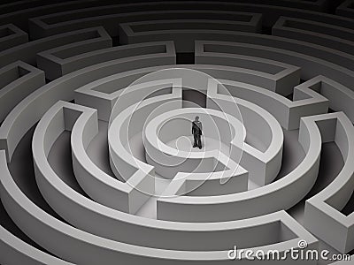 Tiny man in a maze Stock Photo