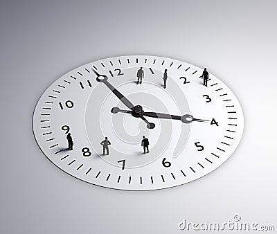 Tiny people standing around a clock Stock Photo