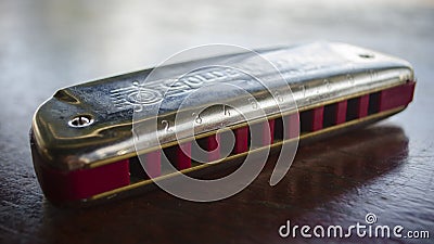 A tiny blues diatonic harmonica Stock Photo