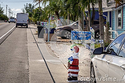 Tiny Santa on the side of the road Stock Photo