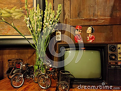 Tiny toys and old TV at the grandpa home late post Stock Photo