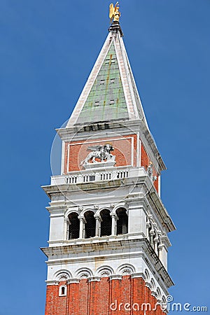 tip of the bell tower in Venice with the statue of the winged li Stock Photo