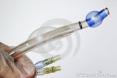 Tip of endobronchial catheter with both valves for inflating tracheal and bronchial cuff visible Stock Photo