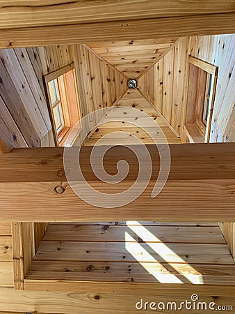 Tippy top timberframe ceiling with sunlight Stock Photo