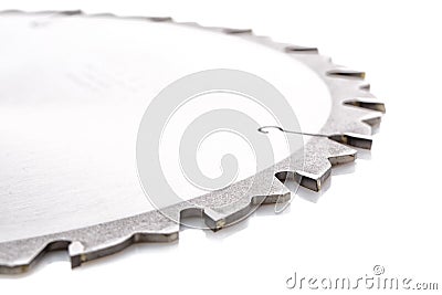 Tips of the teeth of a new ripping saw blade on a white Stock Photo