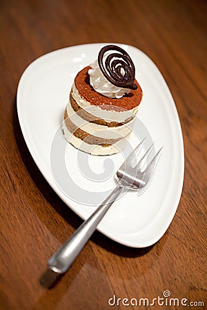 Tiramisu cake on wood table background Stock Photo