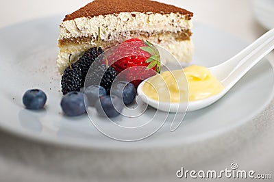 Tiramisu dessert with berries and cream Stock Photo