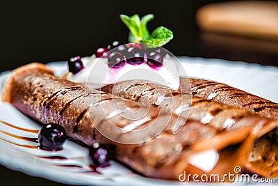 Tiramisu Pancakes with cream and berries, sweet, watering chocolate Stock Photo