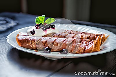 Tiramisu Pancakes with cream and berries, sweet, watering chocolate Stock Photo