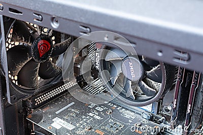 Dust deposited over time on CPU cooling in the computer. Computer cleaning. Inside details ( Editorial Stock Photo