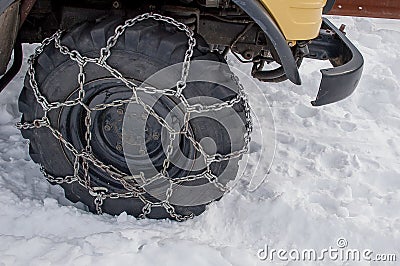 Tire with chains Stock Photo