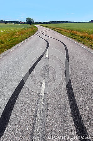 Tire print on the asphalt road Stock Photo