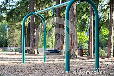 Tire swing for kids on the playground Stock Photo