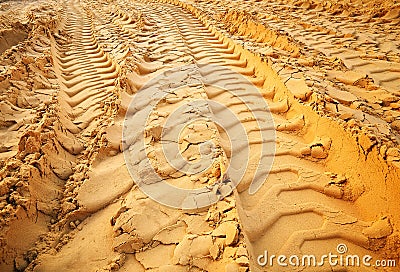 Tire tracks on the sand. Stock Photo