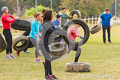 The tire transfer from hand to hand. Editorial Stock Photo