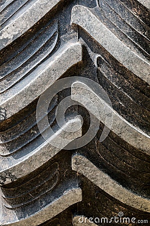 Tire tread of a big wheel of a tractor Stock Photo