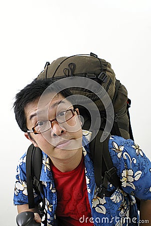 Tired asian backpacker Stock Photo