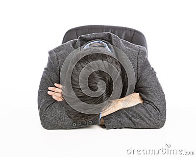 Tired business man sleeping on desk Stock Photo