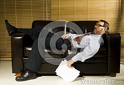 Tired businessman Stock Photo