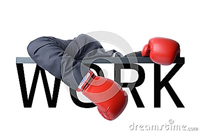 Tired businessman with boxing glove after fight with hard work Stock Photo