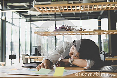 Tired businesswoman sleep at office. exhausted woman dozing at w Stock Photo