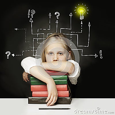 Tired child with books thinking on chalkboard. Stock Photo