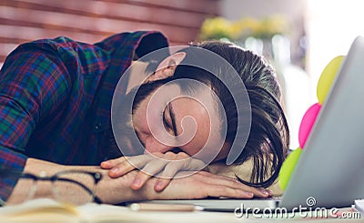 Tired creative editor sleeping Stock Photo