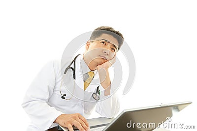 Tired doctor Stock Photo