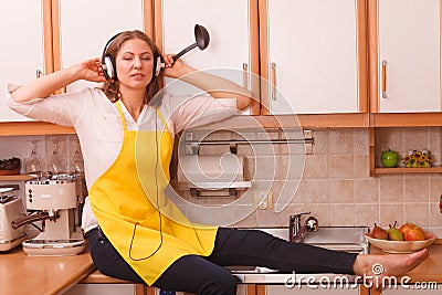 Tired housewife at home Stock Photo