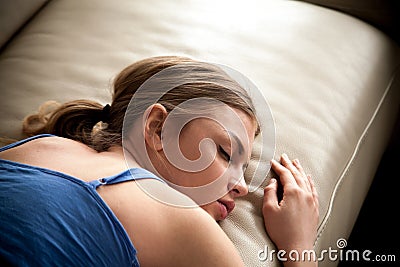 Tired lady falling asleep after sleepless night Stock Photo