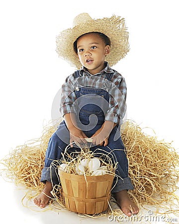 Tired Little Farm Boy Stock Photo