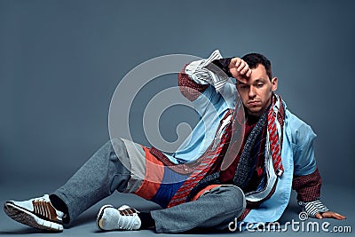Tired male consumer after clothes sale Stock Photo