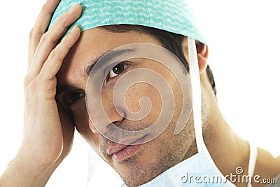 Tired male surgeon Stock Photo