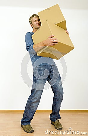 Tired man with cardboards Stock Photo