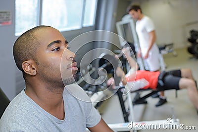 Tired man in gym Stock Photo