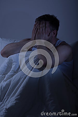 Tired man with sleep problems Stock Photo