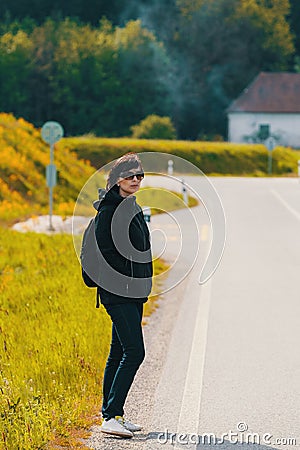 Tired Middle age woman on trip Stock Photo