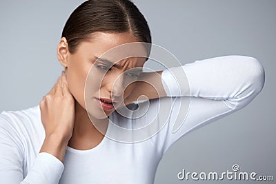 Tired Neck. Beautiful Woman Suffering From Pain, Painful Feeling Stock Photo