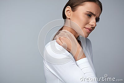 Tired Neck. Beautiful Woman Suffering From Pain, Painful Feeling Stock Photo