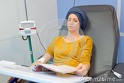 Tired patient having chemo session Stock Photo