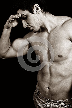 Tired sad weary male bodybuilder Stock Photo