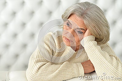 Tired senior woman Stock Photo