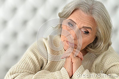 Tired senior woman Stock Photo