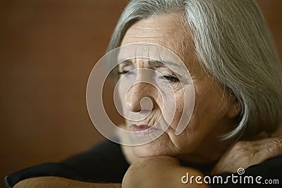 Tired senior woman Stock Photo