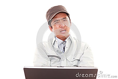 Tired and stressed worker Stock Photo