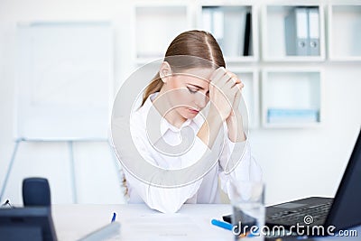 Tired young business woman Stock Photo