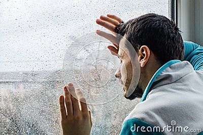 Tired young man suffering from acute pain, male drug addict at rehab clinic Stock Photo