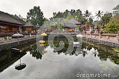 The holy pond. Tirta Empul. Tampaksiring. Gianyar regency. Bali. Indonesia Editorial Stock Photo