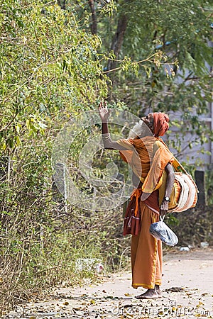 TIRUVANNAMALI, TAMIL NADU, INDIA - MARCH Circa, 2018 . Street photography. Sadhu at Ashram Ramana Maharshi. Sadhu is a holy man, w Editorial Stock Photo