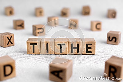 Tithe - words from wooden blocks with letters Stock Photo